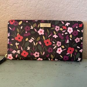Kate Spade full size wallet. Black with pink & purple flowers. Like Brand New